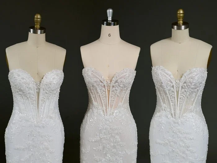 Three versions of the Benjie Royale by Maggie Sottero wedding gown displayed side by side on dress forms. Each gown features a fitted silhouette, a sheer corset bodice with exposed boning, and intricate lace appliqués with beadwork. The center version showcases the most transparent bodice, while the left and right versions feature varying levels of lining and coverage, highlighting customization options within the same romantic, embellished design.