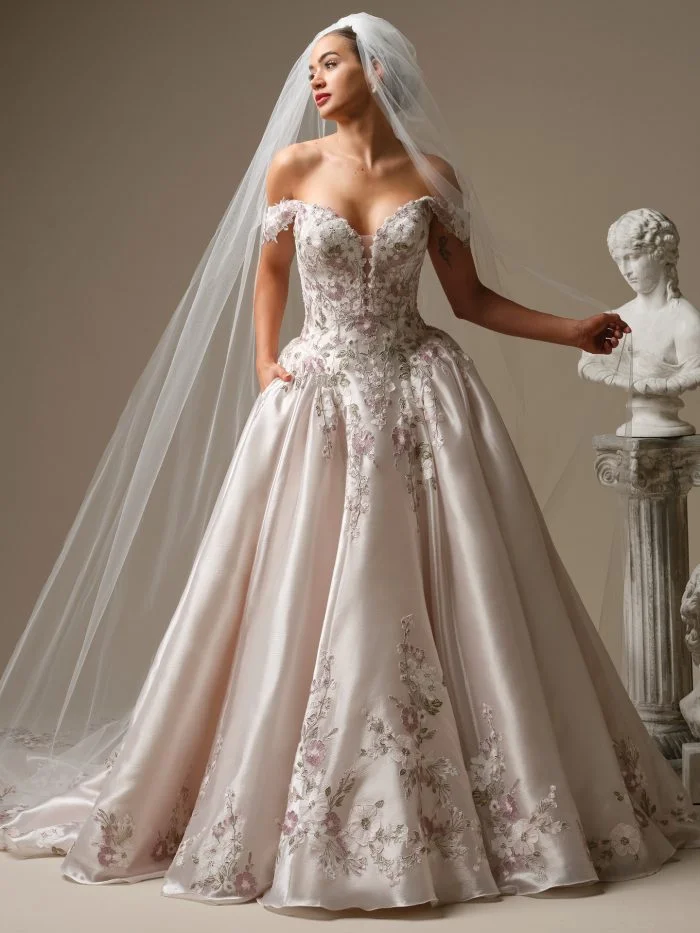 Alvarez by Sottero and Midgley romantic organza ballgown wedding dress with plunging V-neckline and floral lace accents