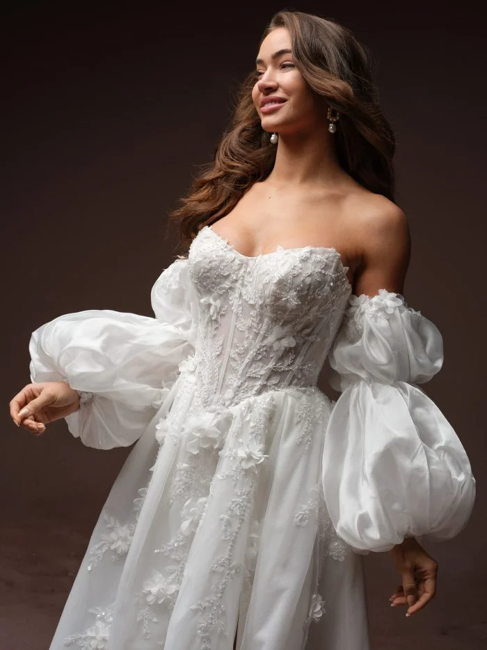 Fern detached sleeves by Maggie Sottero featuring voluminous puff sleeves with floral lace appliqués.