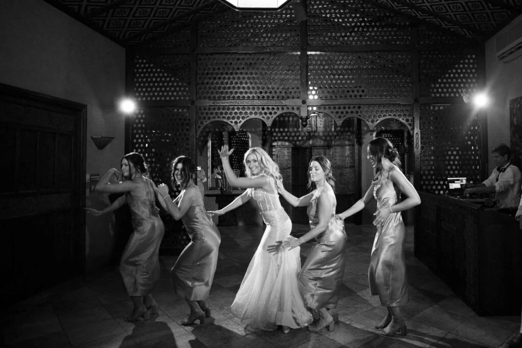 Real Wedding - Victoria + Simon - Villa Botanica by TIMELESS IMAGES BY VANESSA - bride dancing with her bridesmaids at the reception