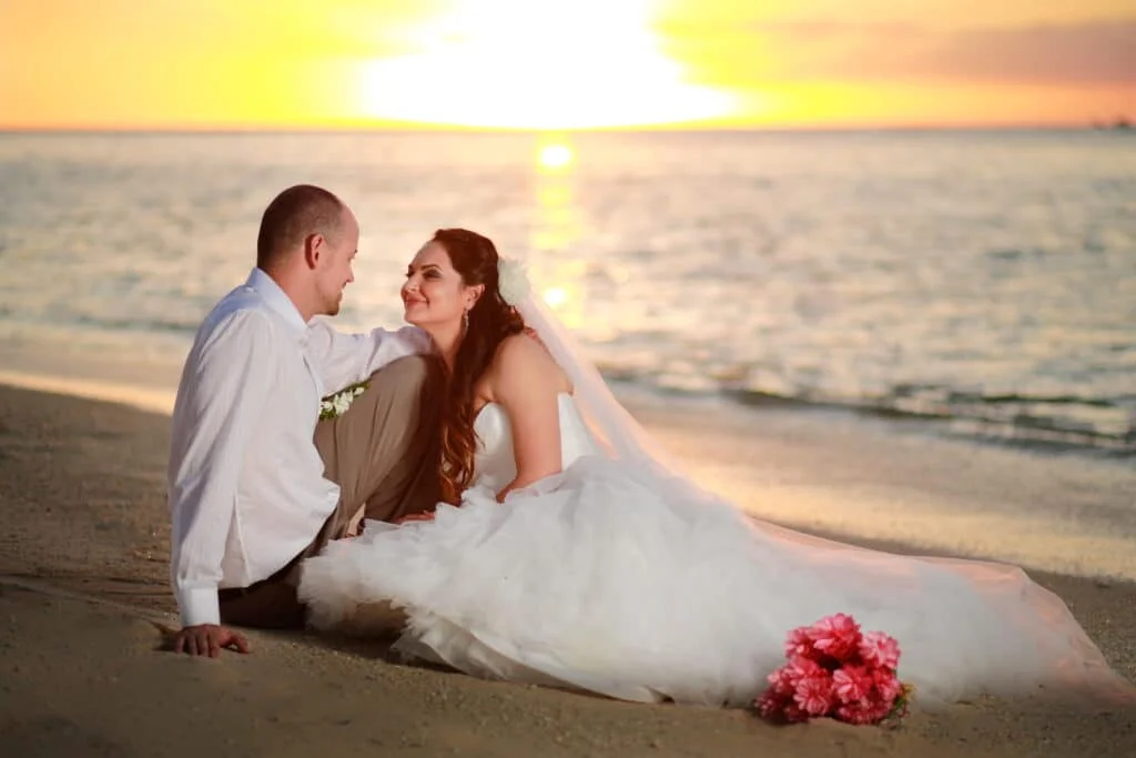 Mana Island Resort & Spa, Fiji - bride and groom photoshoot by the beach shore during sunset