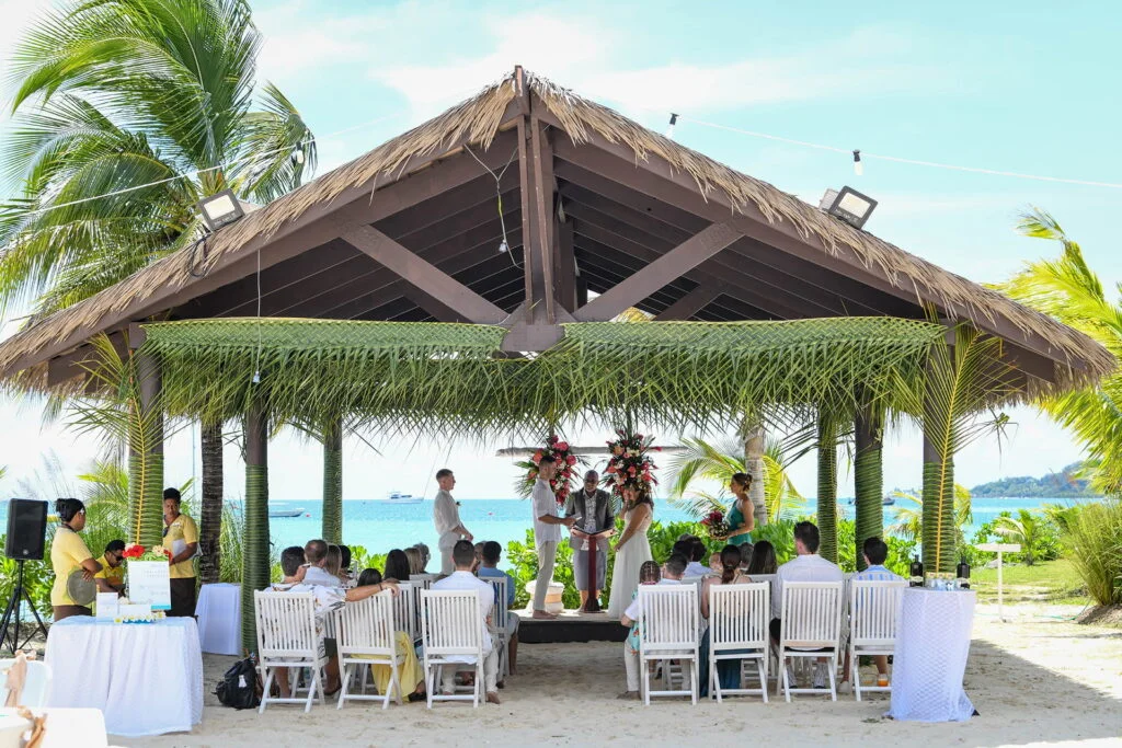 wedding-ceremony-on-a-bure-setup-by-the-beach-at-plantation-island-resort