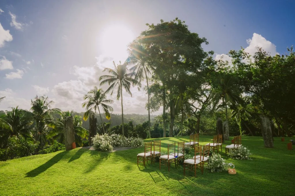 alila-ubud-wedding-aisle-chair-setup-on-a-cliff-with-views-of-the-forest-below