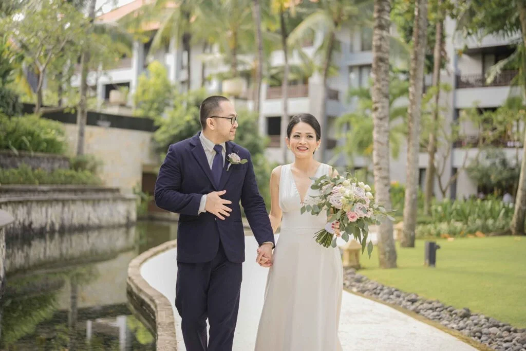 Real Wedding - Conrad Bali - Tressabel and Yovan - Newlyweds walking in the venue