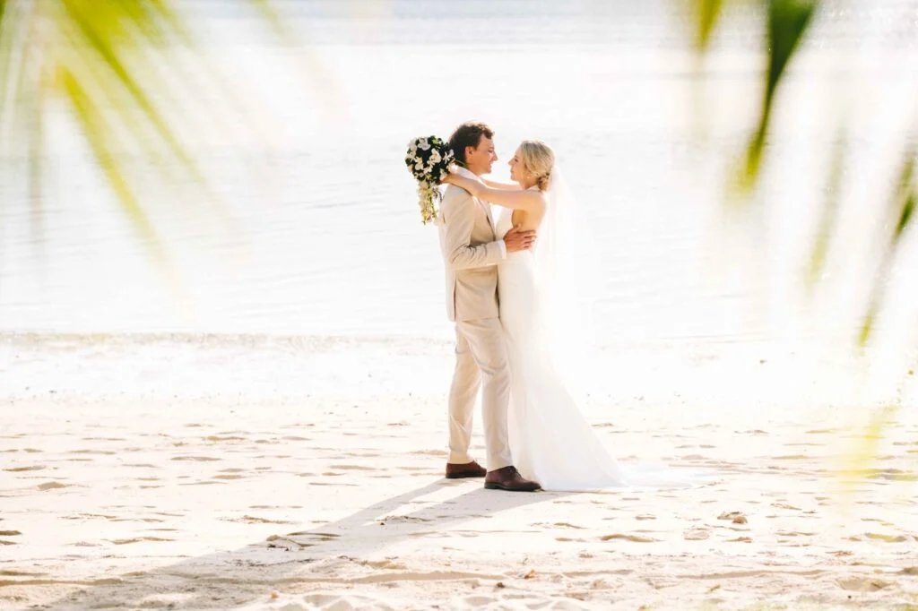 Real Wedding - Plantation Island Resort - Kelly + Ian - bride and groom portrait by the beach