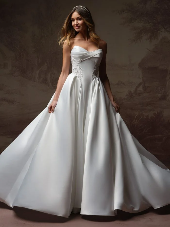 Gigi ballgown wedding dress with detachable panniers, showcasing a draped strapless bodice, elegant lace side accents, and a fashion-forward silhouette inspired by romantic bridal couture.