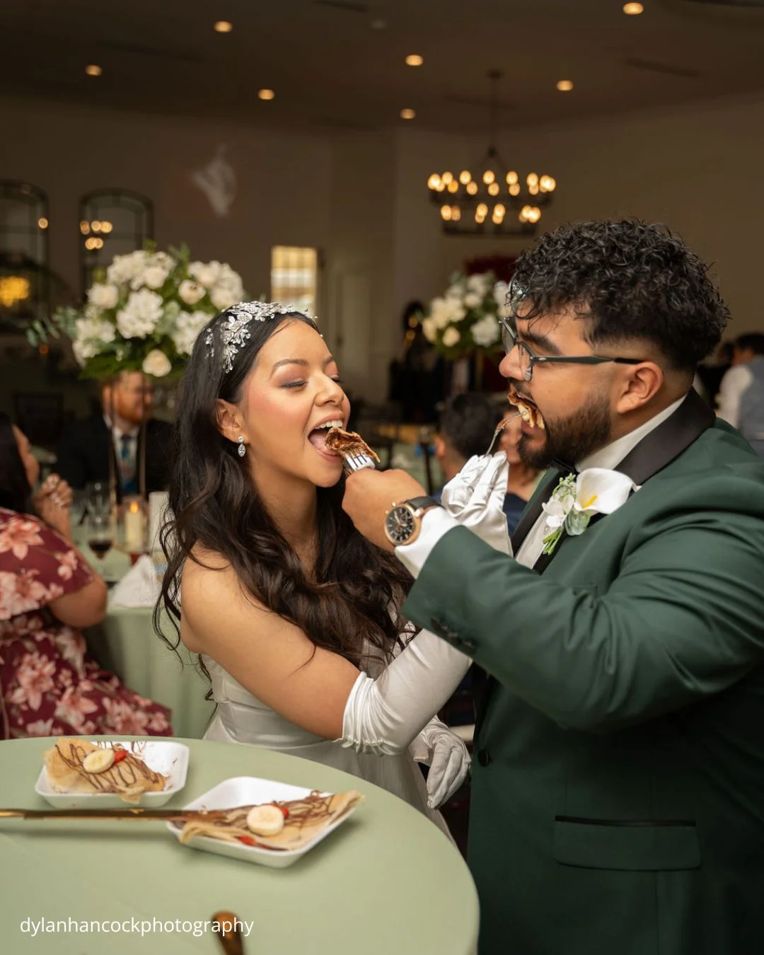 bride and groom eating pancakes at wedding reception dylanhancockphotography