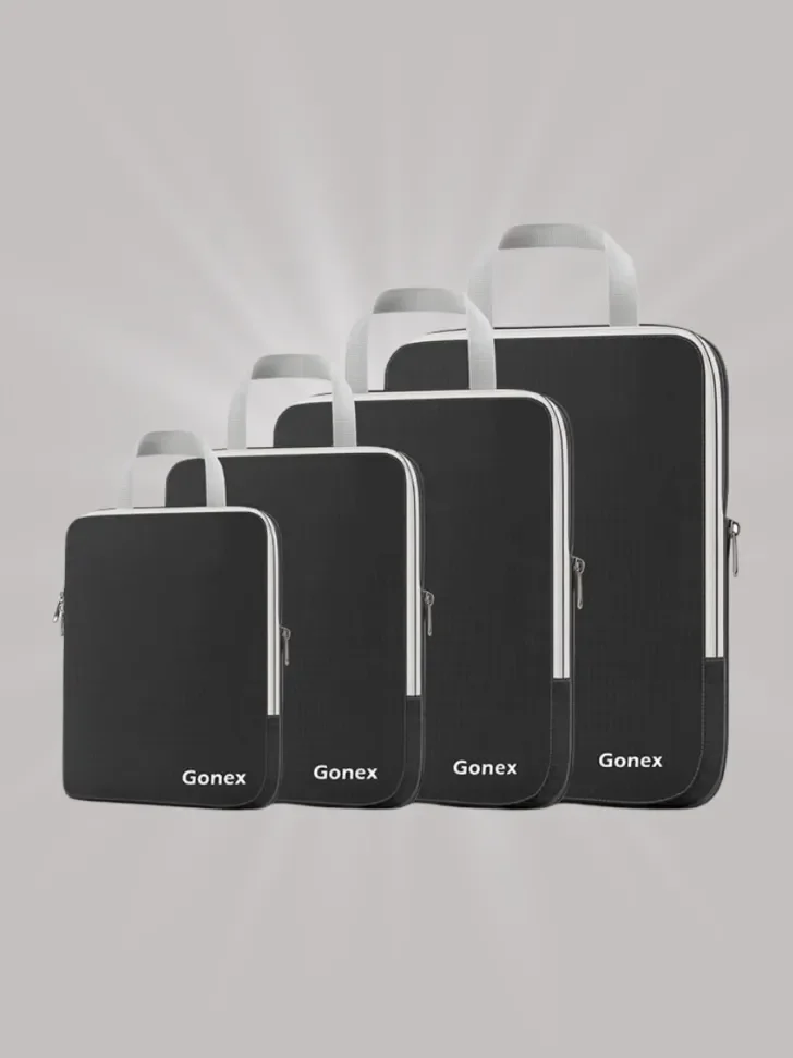 Set of four black packing cubes with gray handles, each labeled with the brand "Gonex."